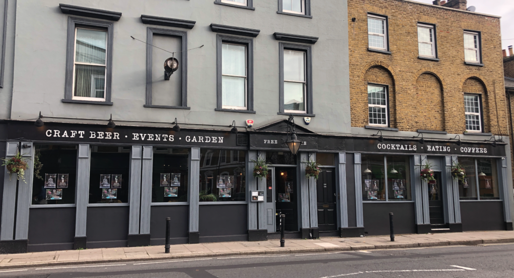 Seraina's Bar Cafe shop signs London