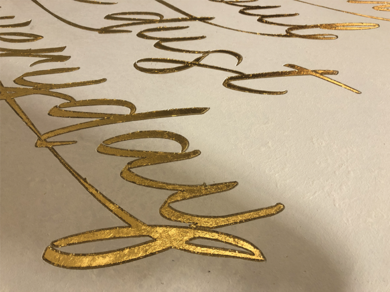 Gilded Xmas sign panel for Sothebys London.

Gold Transom signs, Sign Writing Motcomb Walton Street, art gallery roman lettering signage by Seraina Signs London.