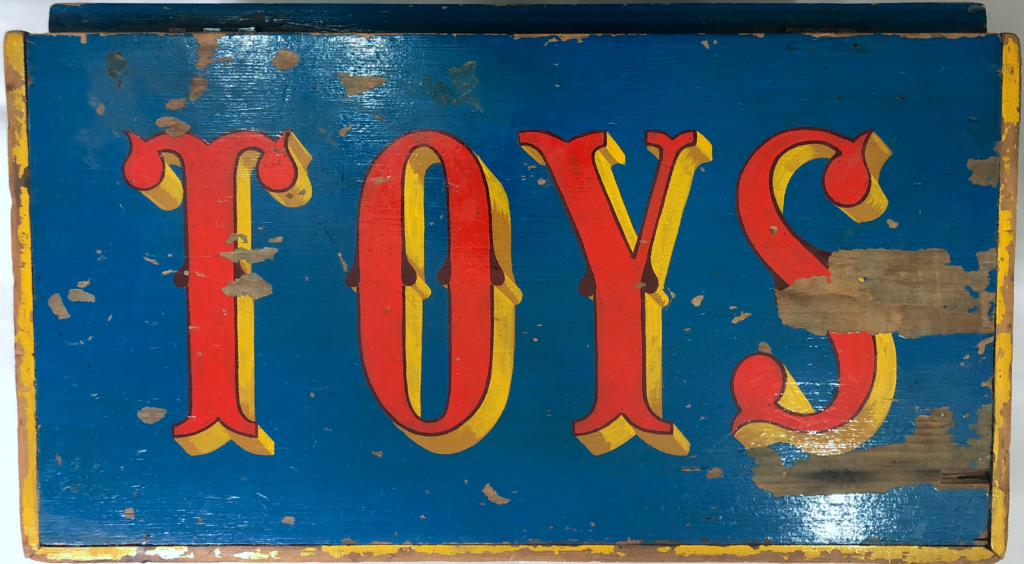 Restoration sign writer, handpainted toy box before restoration