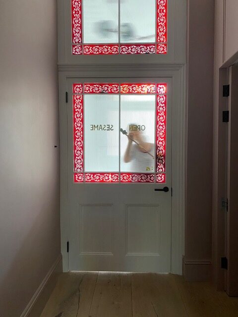 House doors painted signs on glass