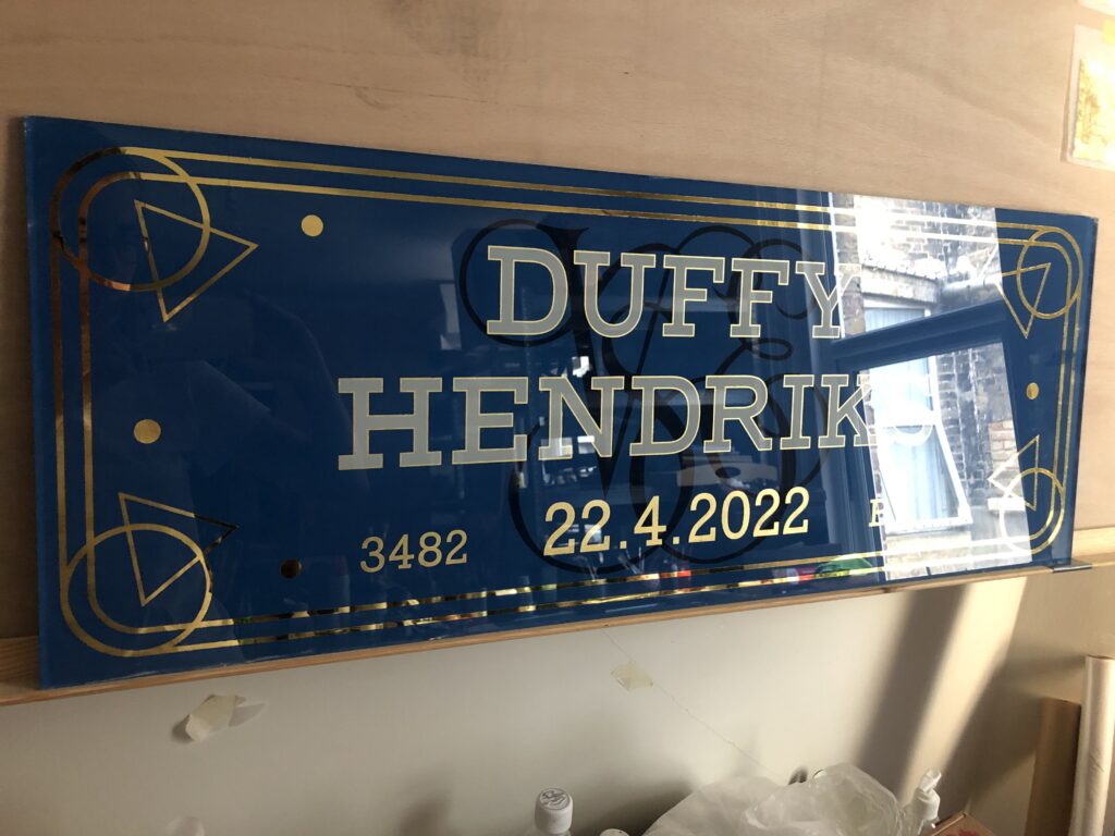 Gift signs by Seraina London sign writer gold leaf specialist, Gift Heirloom signs, Sign Writing Motcomb Walton Street, art gallery roman lettering signage by Seraina Signs London.