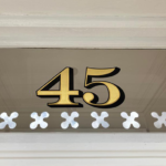 London Sign writer, Traditional sign writer London Shops, House numbers, Gold Leaf, Shop, Chelsea-painted house numeral.jpeg. Retail signs, Shop fitters, Seraina all-signs signs, By Hand painted.Vegan sign writing Woman, Girl sign writer, Gluten Free signs. Healthy house number design, vegan designer. Vegan sign writing Woman, Red Box Cafe Sign Ealing London.