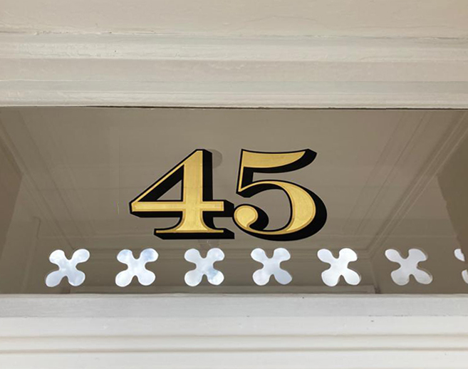 London Sign writer, Traditional sign writer London Shops, House numbers, Gold Leaf, Shop, Chelsea-painted house numeral.jpeg. Retail signs, Shop fitters, Seraina all-signs signs, By Hand painted.Vegan sign writing Woman, Girl sign writer, Gluten Free signs. Healthy house number design, vegan designer. Vegan sign writing Woman, Red Box Cafe Sign Ealing London.