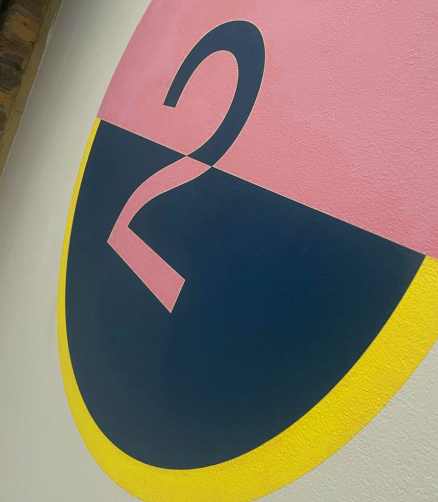 Bold wall graphics for Charlotte Street,  offices... London new age signwriting.