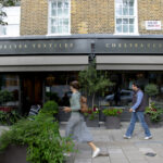 Traditional Roman lettering, Painted Sign Written lettering Pimlico Road, for prestige corporate offices, shops and commercial Seraina Signs.