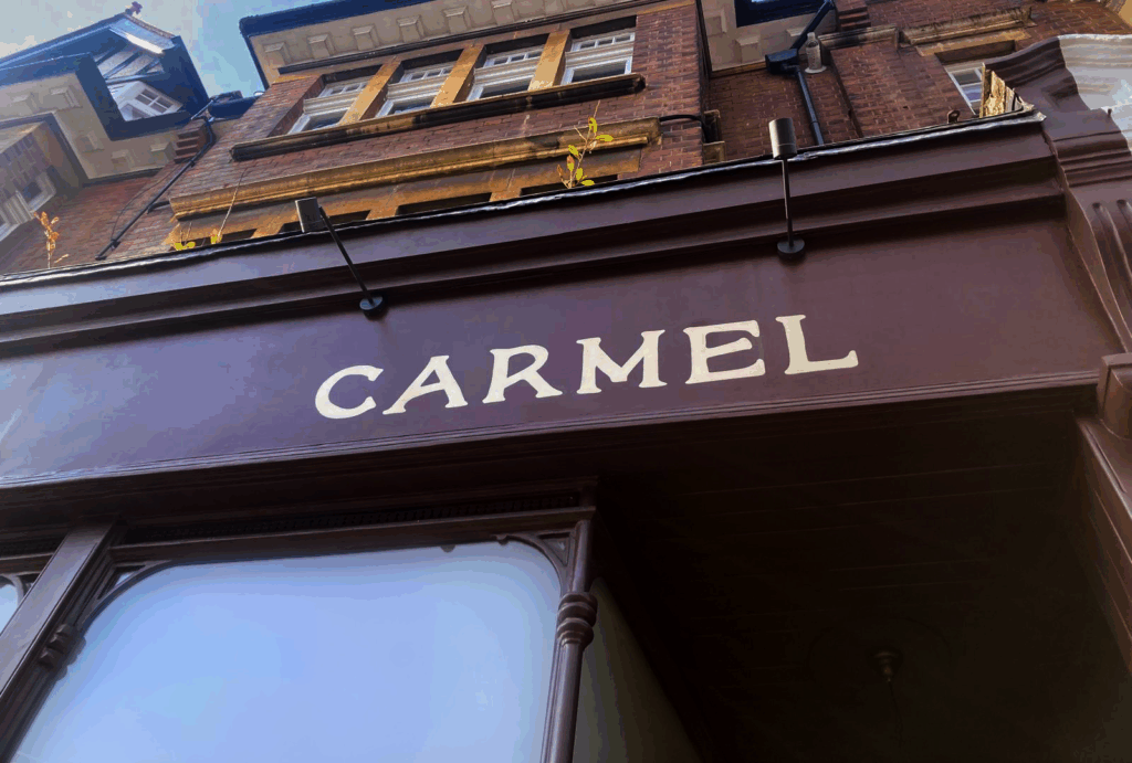 Traditional sign writer, London signs Seriana