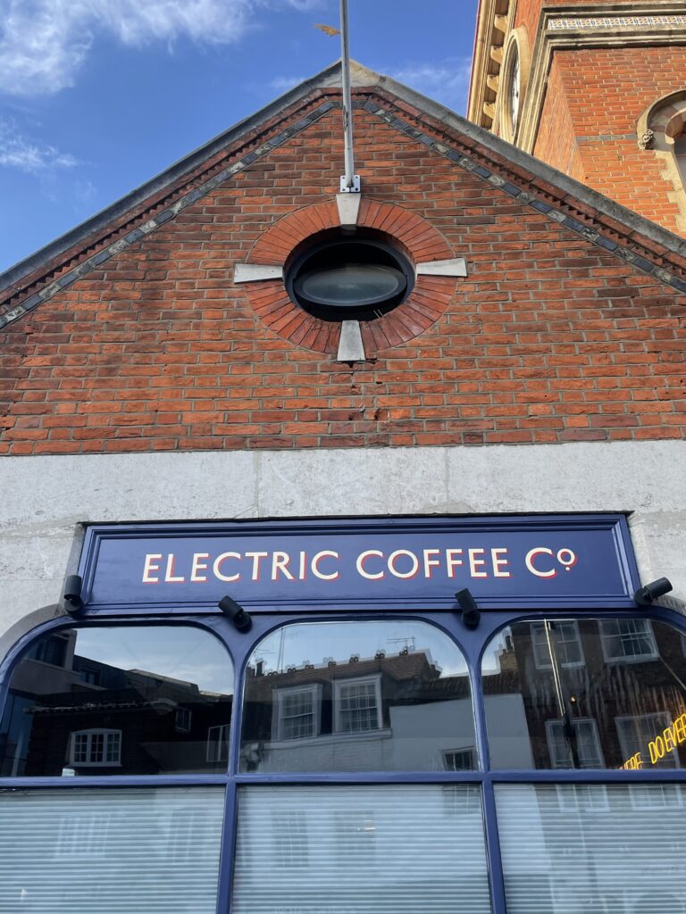 Traditional sign writer london, House numbers, Gold Leaf, Shop, Sign Services London, Hand Painted sign writing, Transom House Numbers gilding. Traditional signwriting, , Chelsea-painted house numeral.jpeg. Retail signs, Shop fitters, Seraina all-signs signs, By Hand painted. Electric coffee co signwriter Seraina