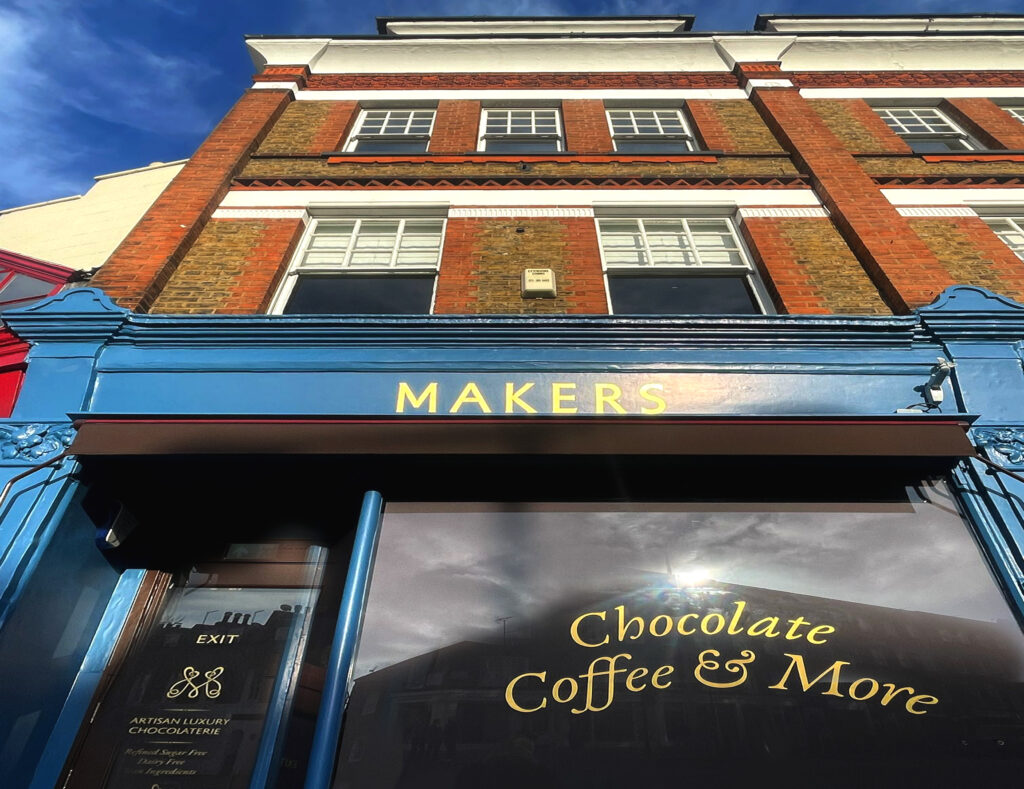 Traditional sign writer, London signs Seriana