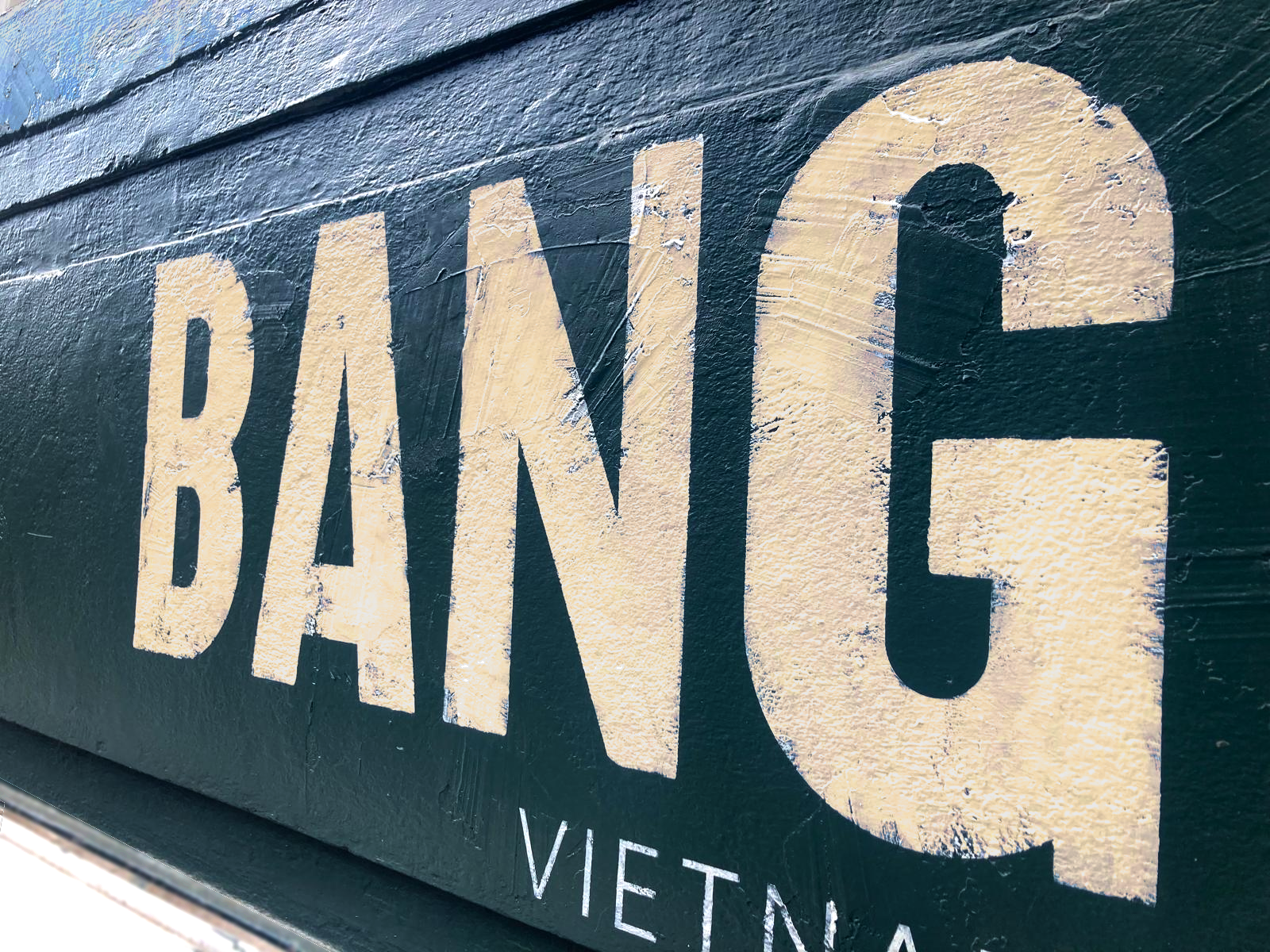 distressed beige letters 'BANG' , Facade fascia sign, ,Warren Street Cafe Signage, Seraina Signs London